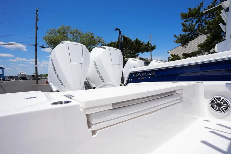 Slide: The Image of 2024 Caymas 281 HB boat with dual Mercury outboard engines. - 14