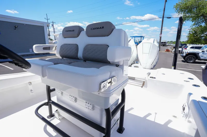 Slide: The Image of 2024 Caymas 281 HB boat with dual seats and modern design. - 23
