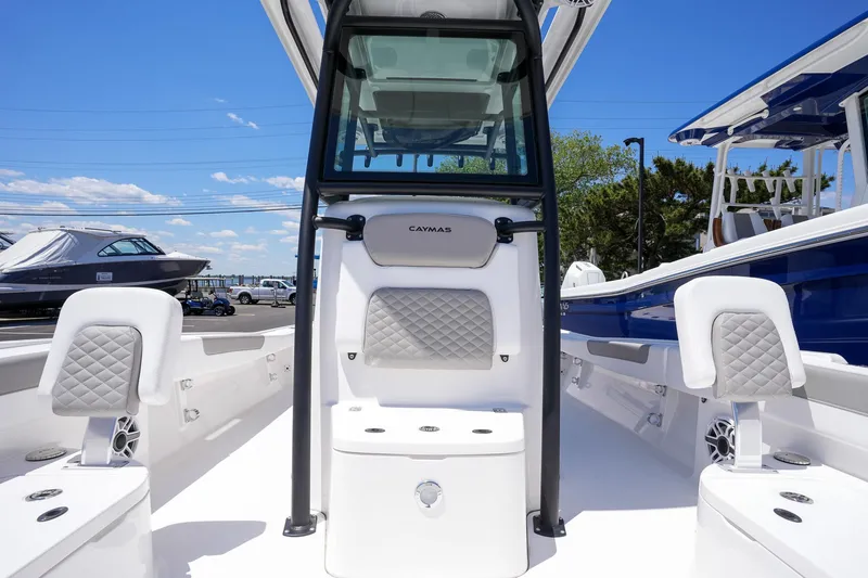 Slide: The Image of 2024 Caymas 281 HB boat interior with seating and console. - 24