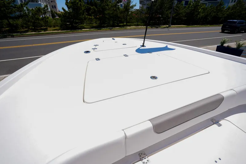 Slide: The Image of 2024 Caymas 281 HB boat deck with storage compartments. - 26