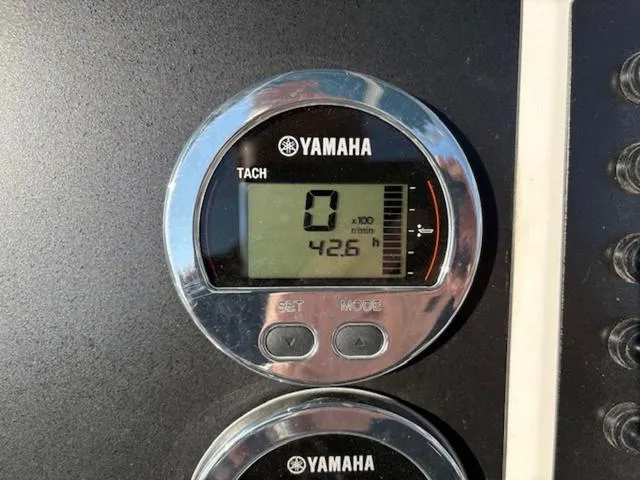 Slide: The Image of Yamaha tachometer display on 2024 Robalo R202EX boat dashboard. - 7