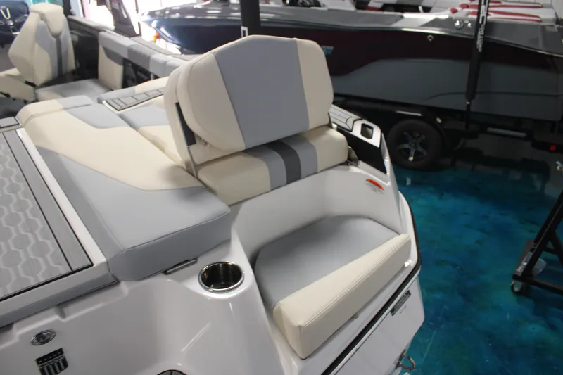 Slide: The Image of 2024 MasterCraft XT24 boat interior with comfortable seating and modern design. - 30