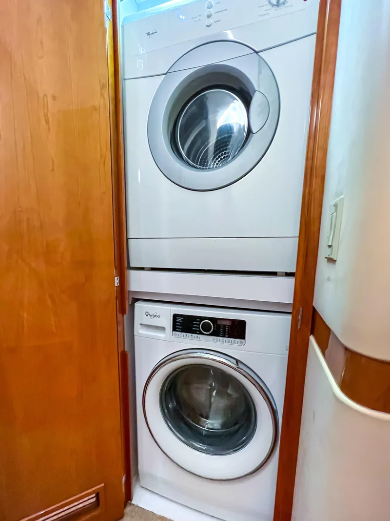 Slide: The Image of Stacked washer and dryer in 2007 Hatteras 68 Convertible yacht. - 22