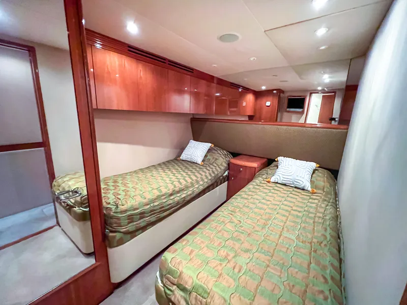 Slide: The Image of Luxurious twin cabin interior of 2007 Hatteras 68 Convertible yacht. - 30