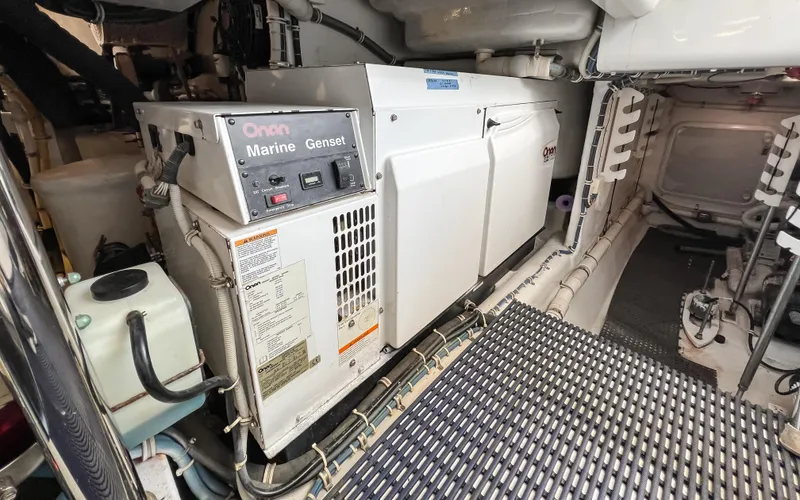 Slide: The Image of Engine room of 2007 Hatteras 68 Convertible with Onan Marine Genset. - 37