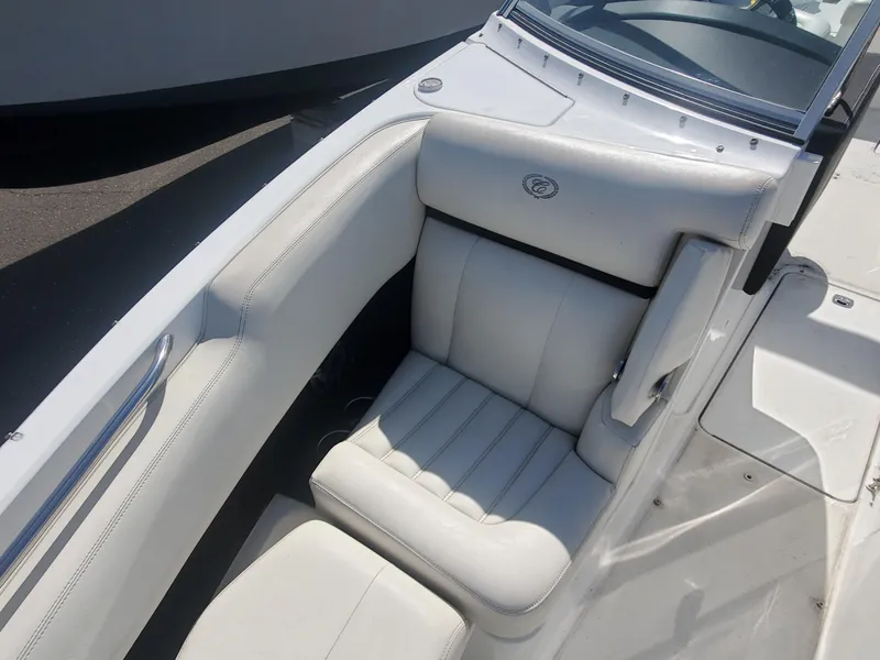 Slide: The Image of 2016 Cobalt R5 boat with white leather seating and sleek design. - 11