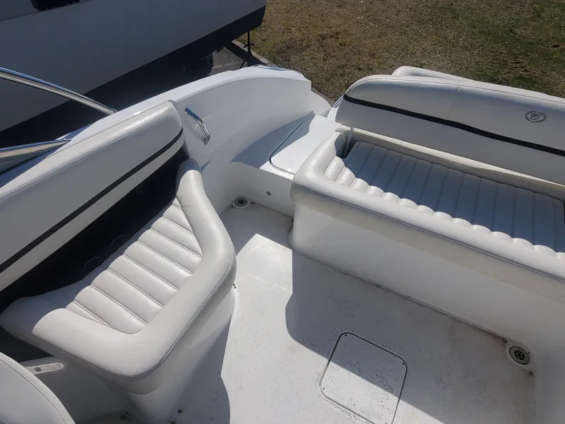 Slide: The Image of 2016 Cobalt R5 boat interior with white leather seating. - 15