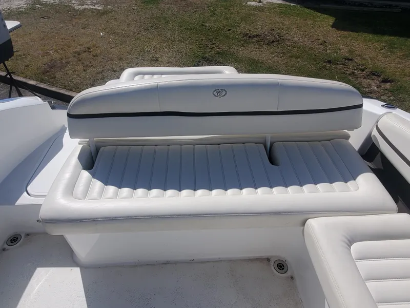 Slide: The Image of 2016 Cobalt R5 boat with white leather seating in the sun. - 16