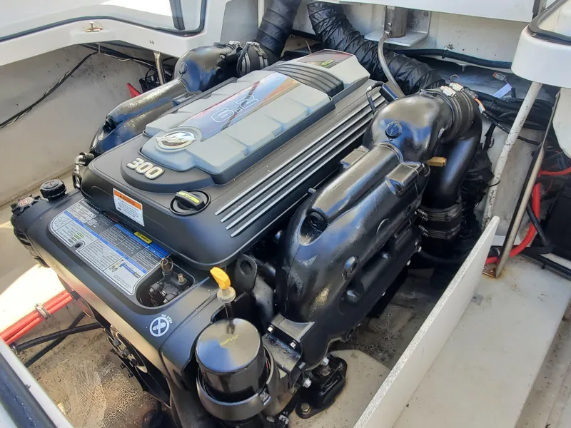 Slide: The Image of 2016 Cobalt R5 boat engine compartment with a 300 HP engine. - 23