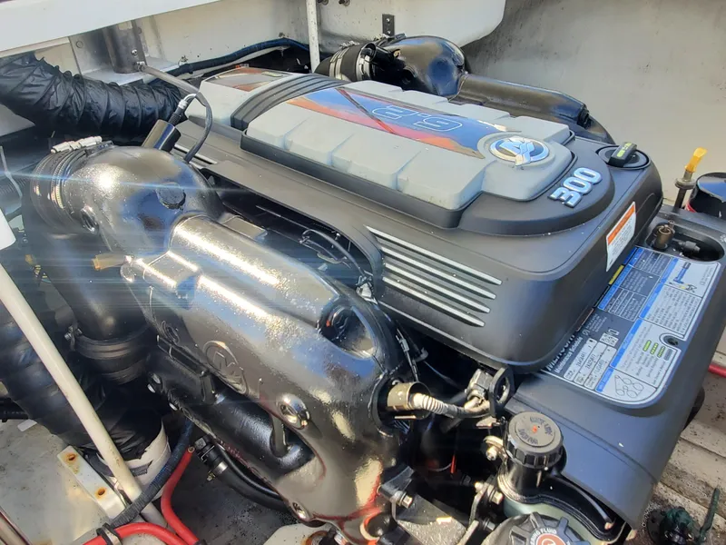 Slide: The Image of 2016 Cobalt R5 boat engine compartment with a 300 horsepower engine. - 24