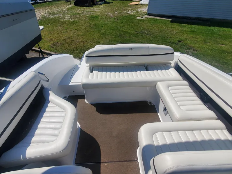 Slide: The Image of 2016 Cobalt R5 boat with white leather seating and spacious interior. - 29