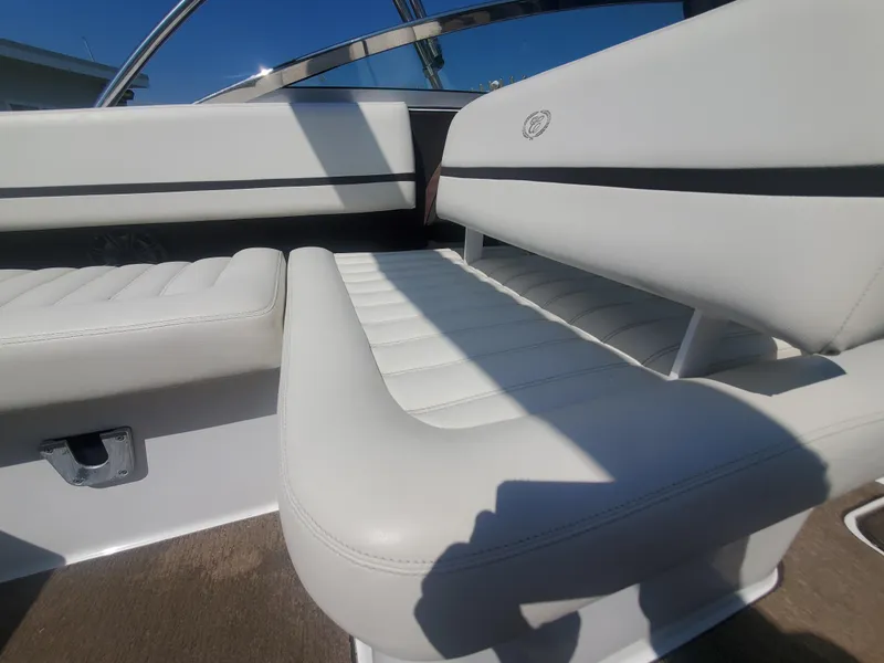 Slide: The Image of 2016 Cobalt R5 boat with white leather seating and stainless steel accents. - 33