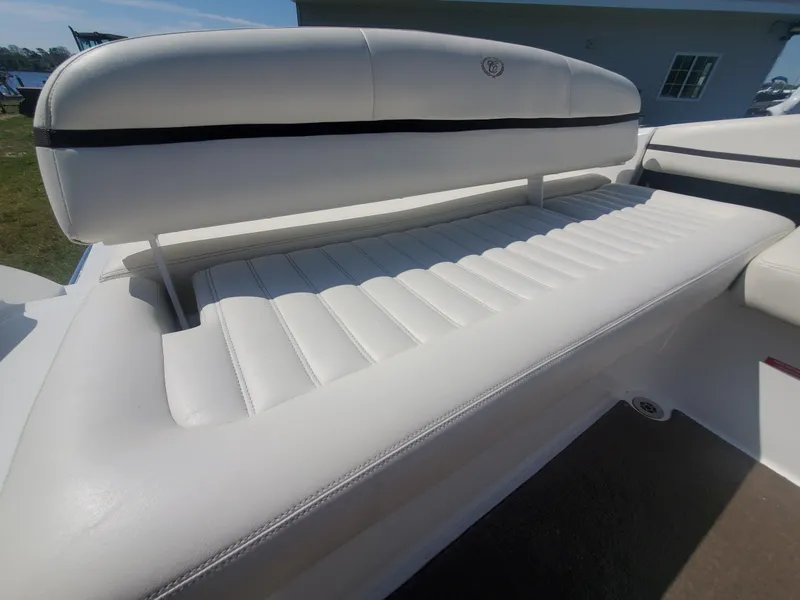 Slide: The Image of 2016 Cobalt R5 boat with white cushioned seating. - 36