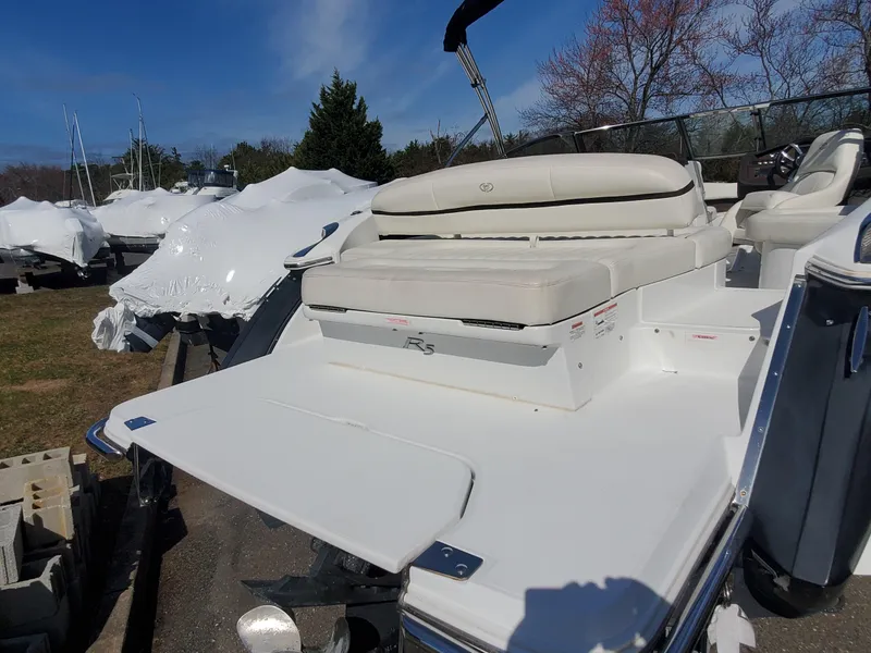 Slide: The Image of 2016 Cobalt R5 boat on a trailer under a clear blue sky. - 8
