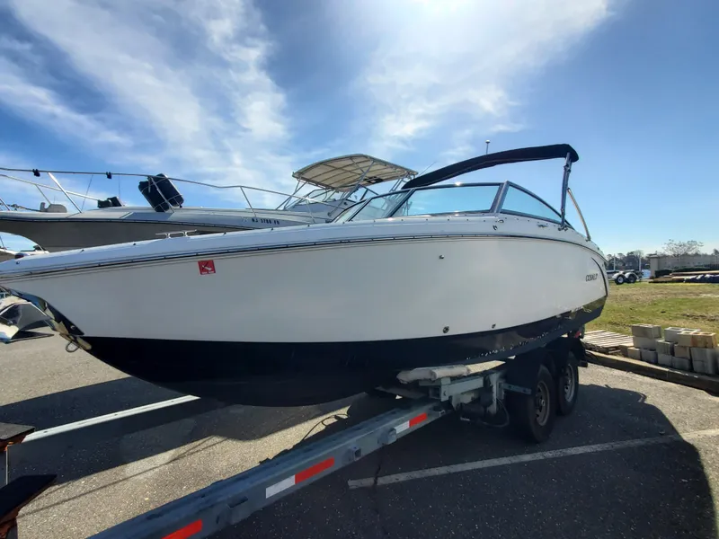 Slide: The Image of 2016 Cobalt R5 boat with white seating and swim platform. - 9