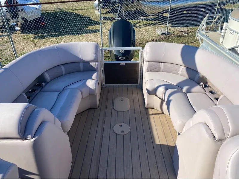 Slide: The Image of 2017 Bennington 22 GSR pontoon boat with spacious seating and wood-like flooring. - 5