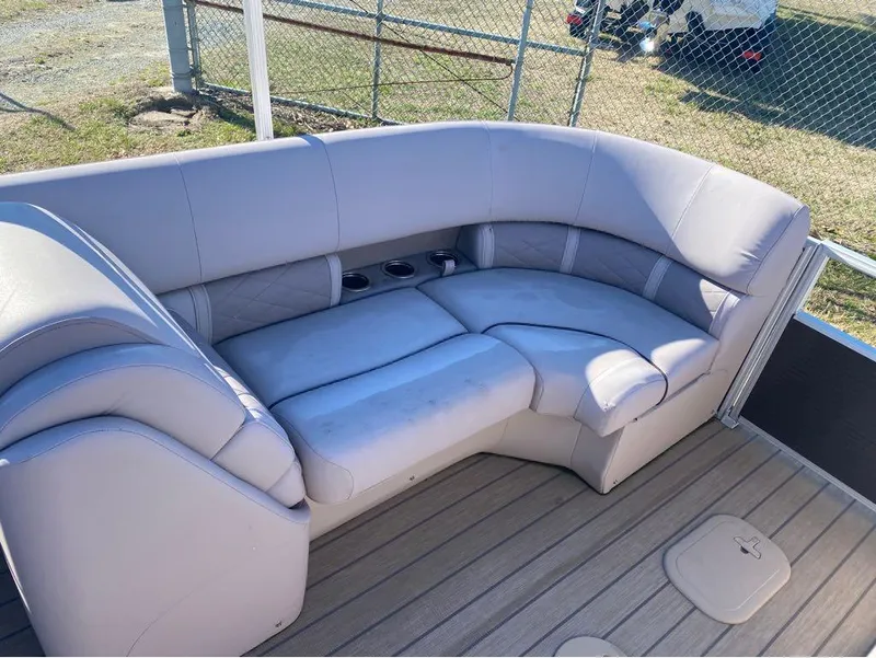 Slide: The Image of 2017 Bennington 22 GSR pontoon boat with plush seating and cup holders. - 6