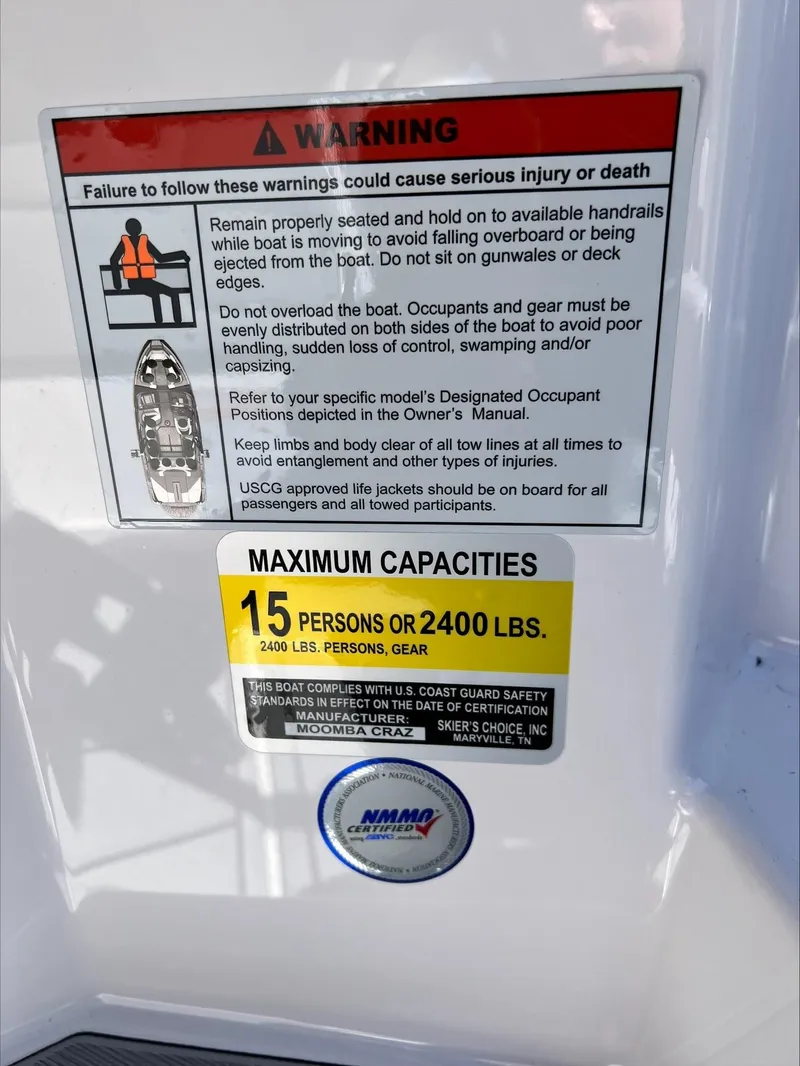 Slide: The Image of Warning and capacity labels on 2024 Moomba Craz boat, max 15 persons or 2400 lbs. - 21