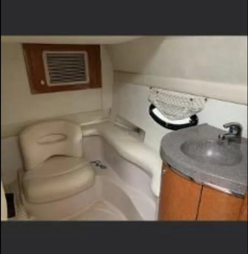 Slide: The Image of Interior cabin of a 2001 Doral 330se boat with seating and sink. - 20