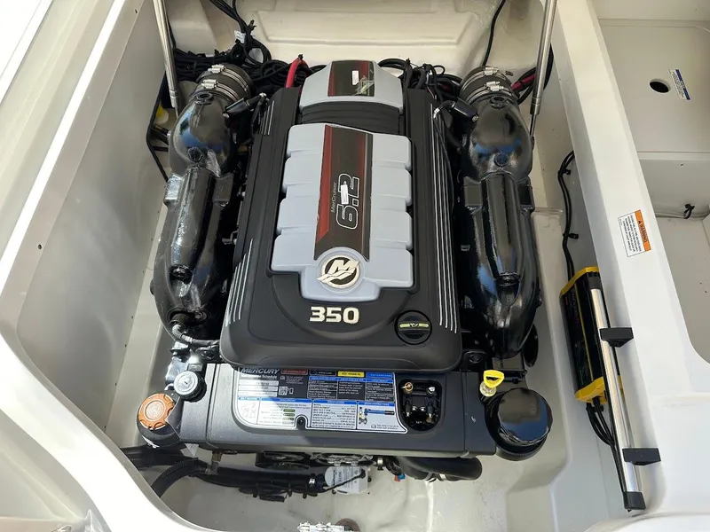 Slide: The Image of 2024 Sea Ray SDX 250 boat engine compartment with 350 HP engine. - 27