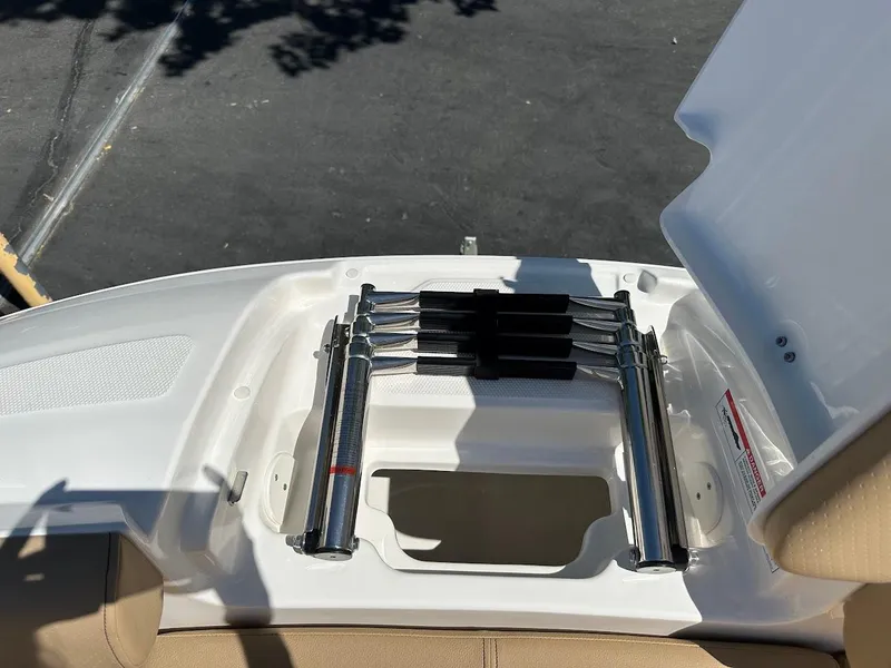 Slide: The Image of 2024 Sea Ray SDX 250 swim platform with retractable ladder. - 36