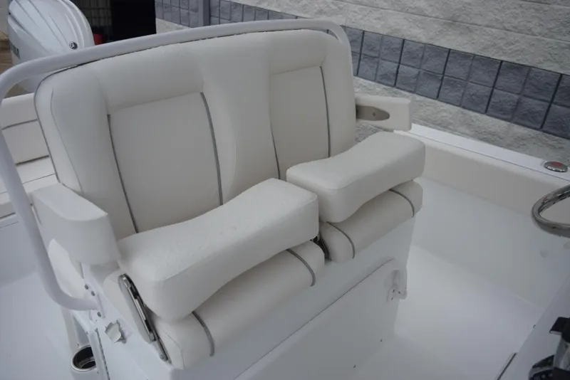 Slide: The Image of 2024 Sea Hunt Escape 27 boat's white cushioned seating. - 12