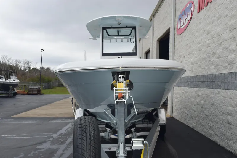 Slide: The Image of 2024 Sea Hunt Escape 27 boat on trailer outside dealership. - 3