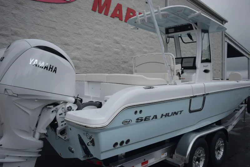Slide: The Image of 2024 Sea Hunt Escape 27 boat with Yamaha engine on trailer. - 4