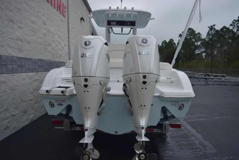 Slide: The Image of 2024 Sea Hunt Escape 27 with twin Yamaha 200 outboard engines. - 5