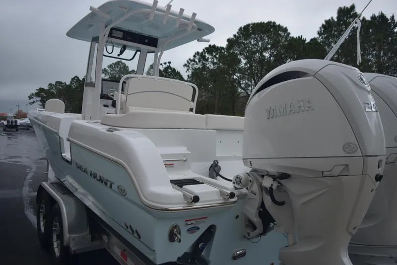 Slide: The Image of 2024 Sea Hunt Escape 27 boat with Yamaha outboard engines. - 6
