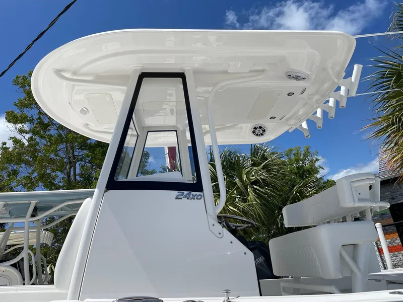 Slide: The Image of 2024 Regulator 24XO boat with T-top and center console. - 4