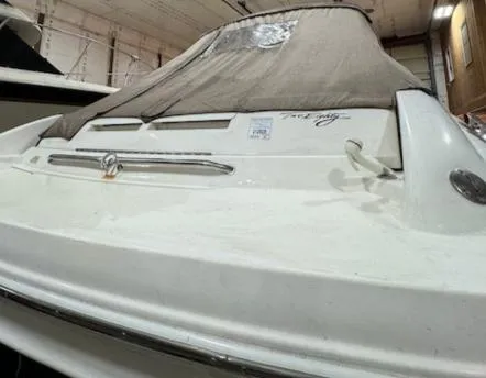 Slide: The Image of 1997 Sea Ray 280 boat in storage, rear view. - 28