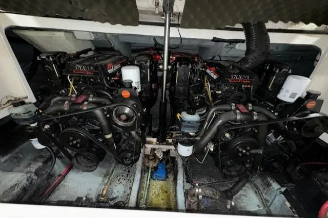 Slide: The Image of Engine compartment of a 1997 Sea Ray 280 boat with twin engines. - 37