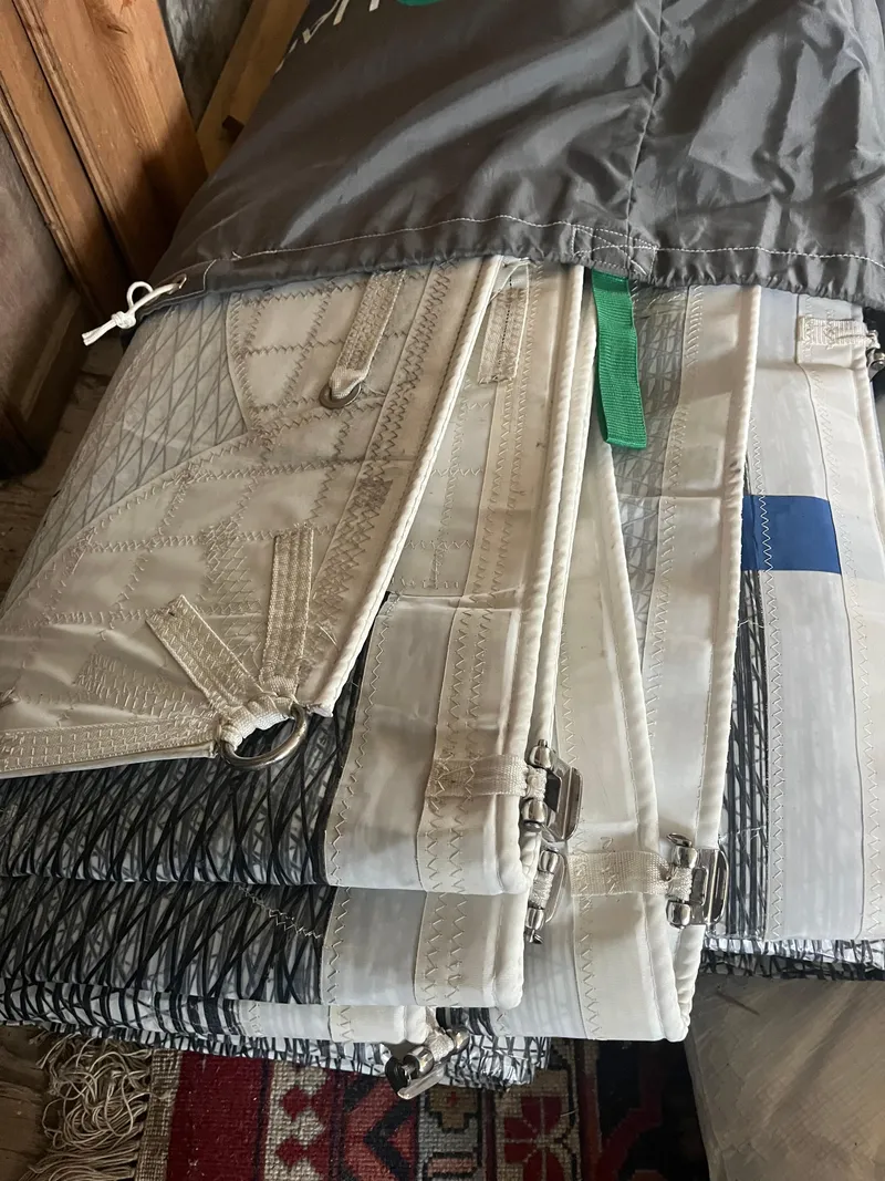 Slide: The Image of Folded sail with intricate stitching, suitable for a 1980 C&C 34 sailboat. - 6