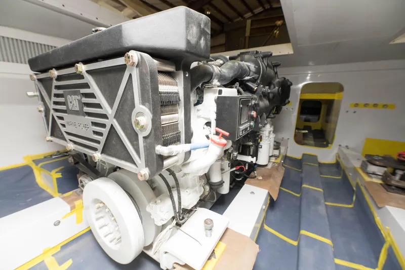 Slide: The Image of Custom Carolina 63 2024 model engine room with CAT engine. - 29
