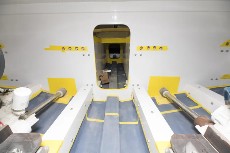 Slide: The Image of Engine room of 2024 Custom Carolina 63 boat under construction. - 31