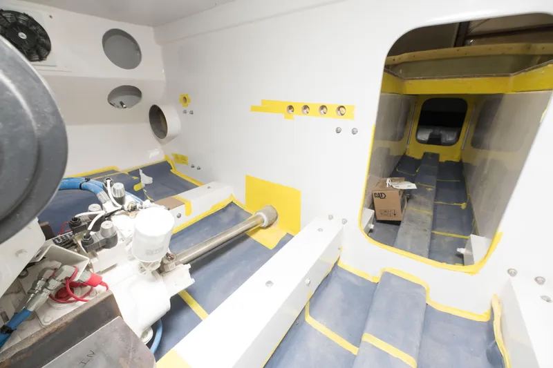 Slide: The Image of Interior of a 2024 Custom Carolina 63 boat under construction. - 32