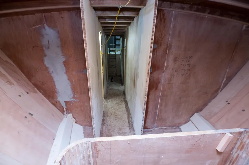 Slide: The Image of Interior construction of 2024 Custom Carolina 63 boat in progress. - 43