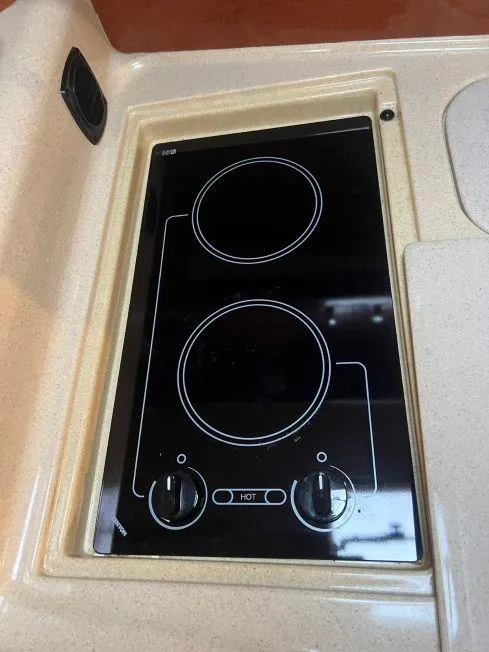 Slide: The Image of Built-in stovetop on 2002 Sea Ray 340 Sundancer yacht. - 5