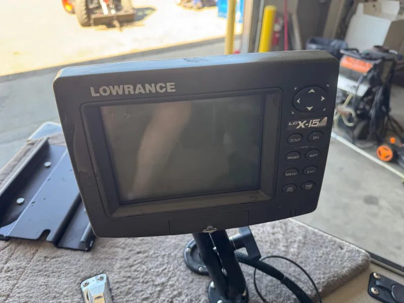 Slide: The Image of Lowrance LCX-15MT fish finder on a 2002 Lund 1775 Pro-V SE boat. - 14