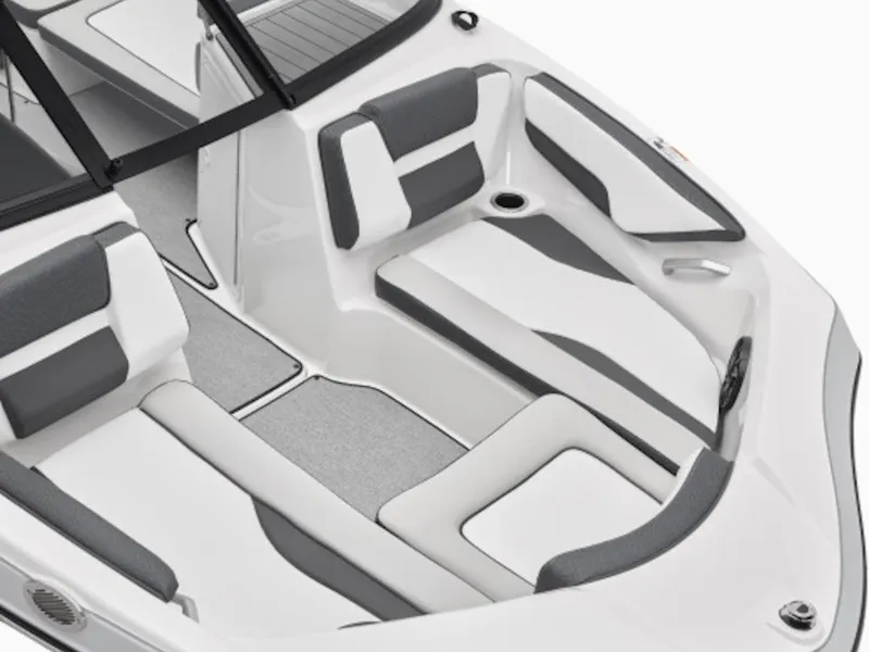 Slide: The Image of 2024 Yamaha Boats AR195 interior seating area with gray and white upholstery. - 6
