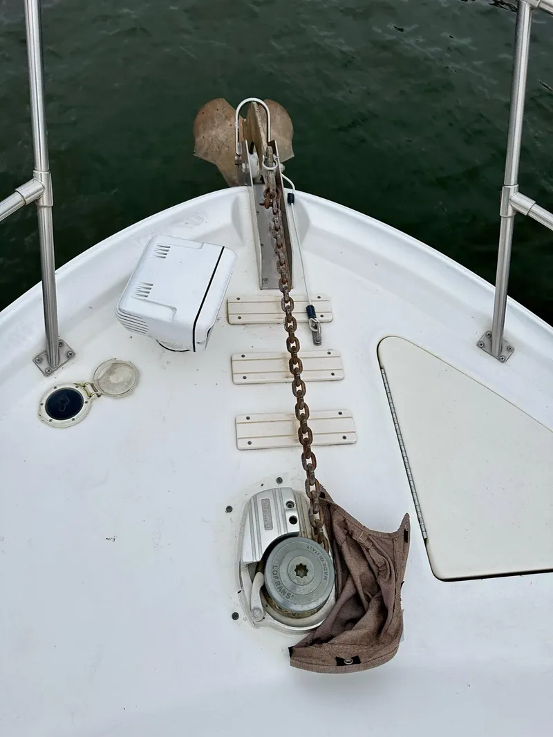 Slide: The Image of Bow of 1997 Sea Ray 370 Sundancer with anchor chain and winch. - 20