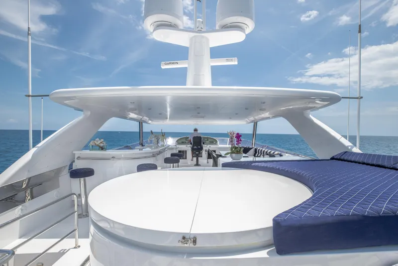 Slide: The Image of Luxurious 2005 Horizon 94 Motoryacht deck with seating and ocean view. - 15