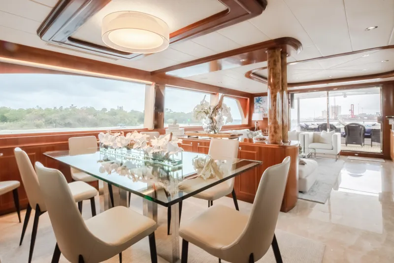 Slide: The Image of Luxurious interior of a 2005 Horizon 94 Motoryacht with elegant dining area. - 20