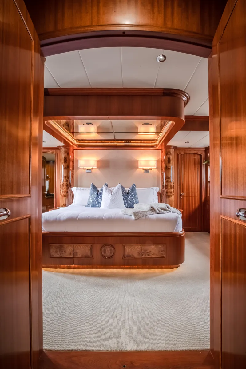 Slide: The Image of Luxurious master bedroom on a 2005 Horizon 94 Motoryacht. - 26
