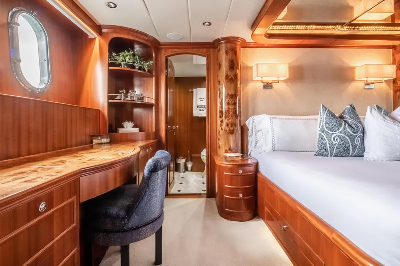 Slide: The Image of Luxurious bedroom interior of 2005 Horizon 94 Motoryacht with elegant wood finishes and modern decor. - 30