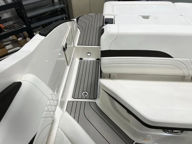 Slide: The Image of 2024 Sea Ray SLX 260 boat interior with sleek seating and modern design. - 19