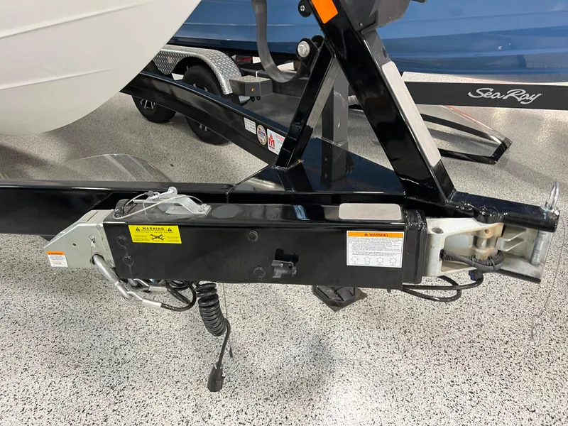 Slide: The Image of 2024 Sea Ray SLX 260 boat trailer hitch and frame detail. - 5