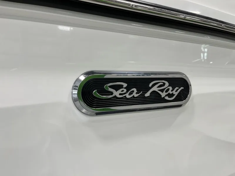 Slide: The Image of 2024 Sea Ray SLX 260 logo on white boat exterior - 79