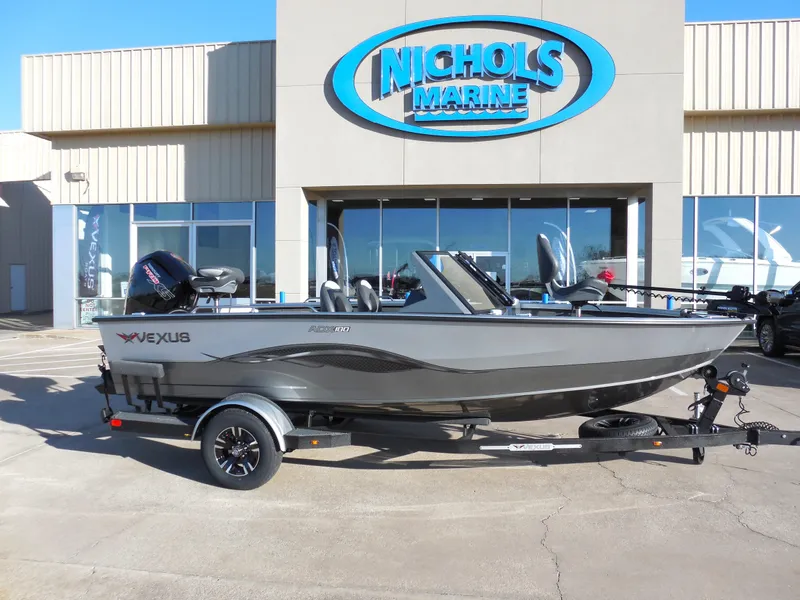 Slide: The Image of 2024 Vexus ADX 180 boat at Nichols Marine dealership. - 1